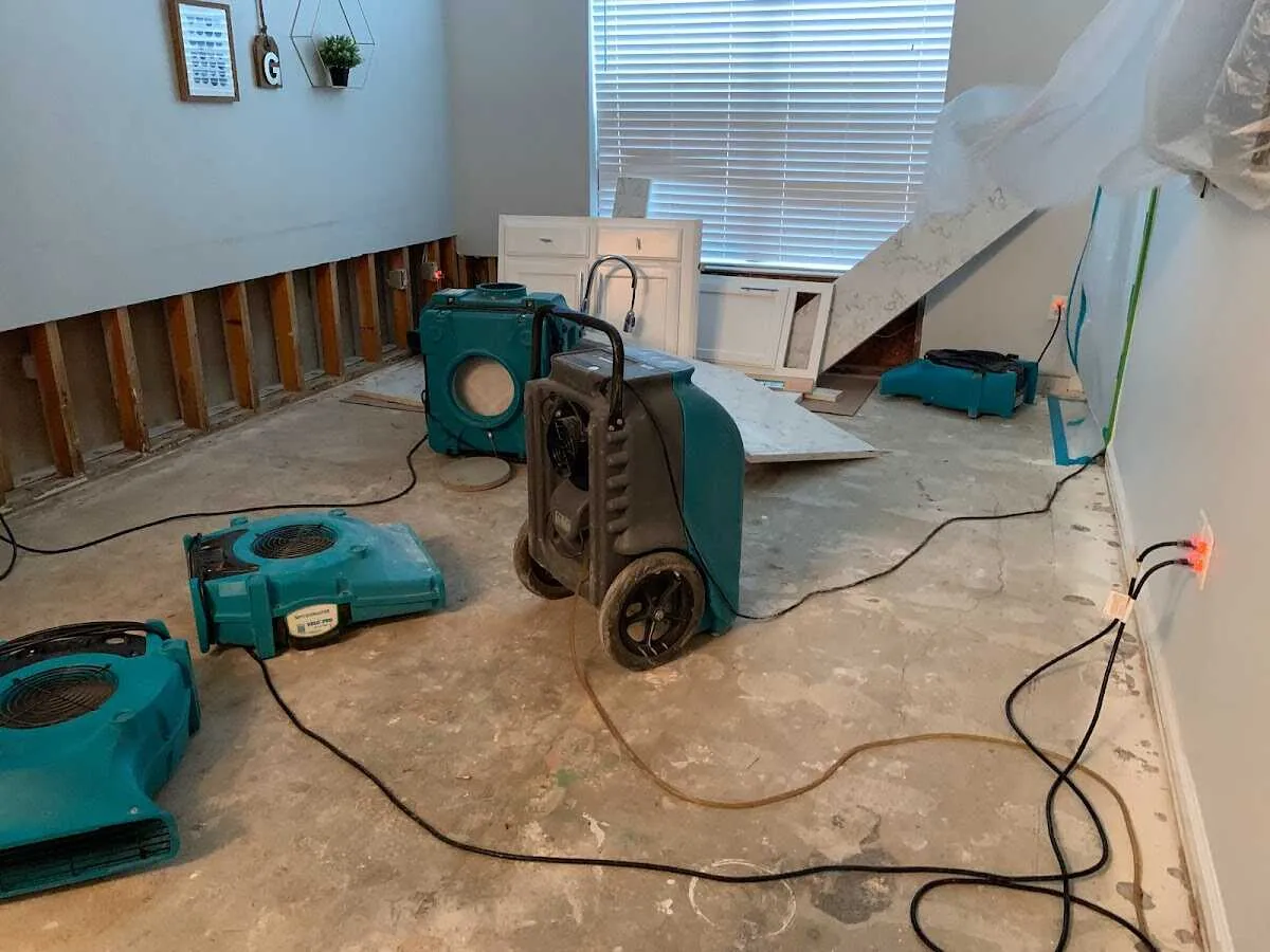 Dehumidifier in flood-cut room for Water Damage Restoration in Muleshoe